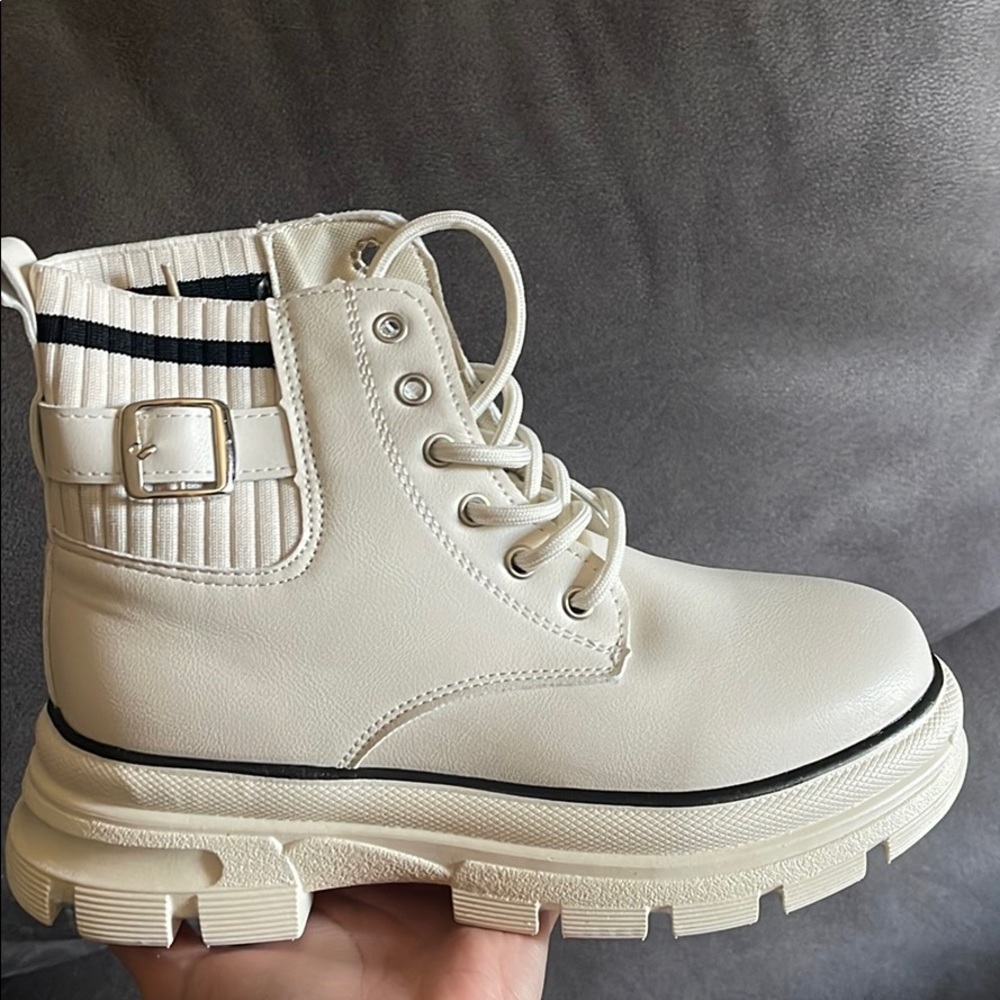 Brand new cream colored boots.